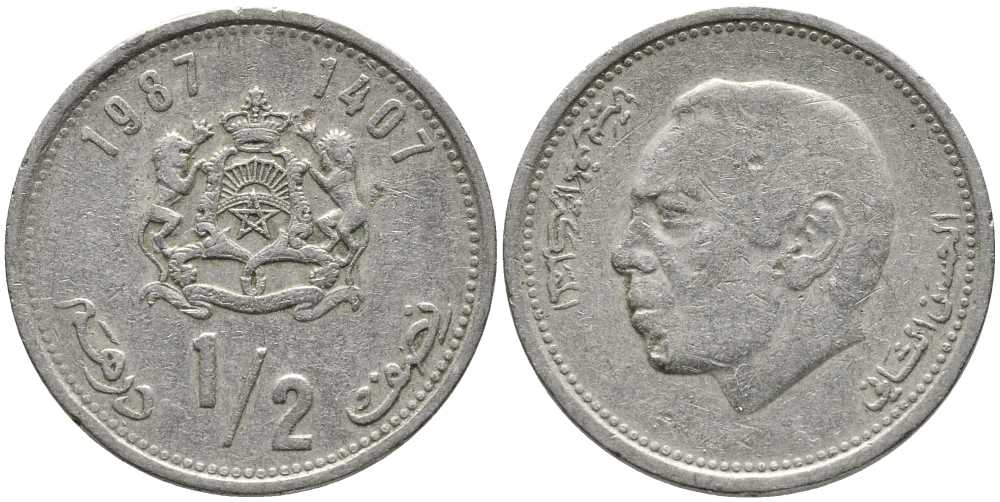 МАРОККО 1/2 ДИРХЕМА 1987 ГОД 1407, АЛЬ ХАССАН II (1962-1999) KM 84 медно-никель 110-643