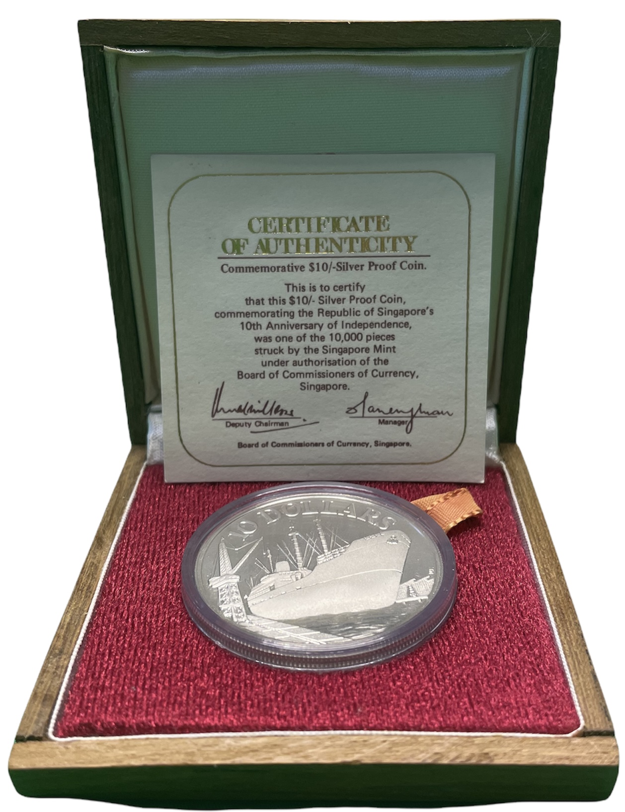 Сингапур 10 долларов 1975 10 лет независимости (1965-1975), корабль в порту, тираж 10000 экз., вес 31,1 г., проба 500, в оригинальной коробке, с сертификатом KM 11 серебро PROOF 5-4-3-03