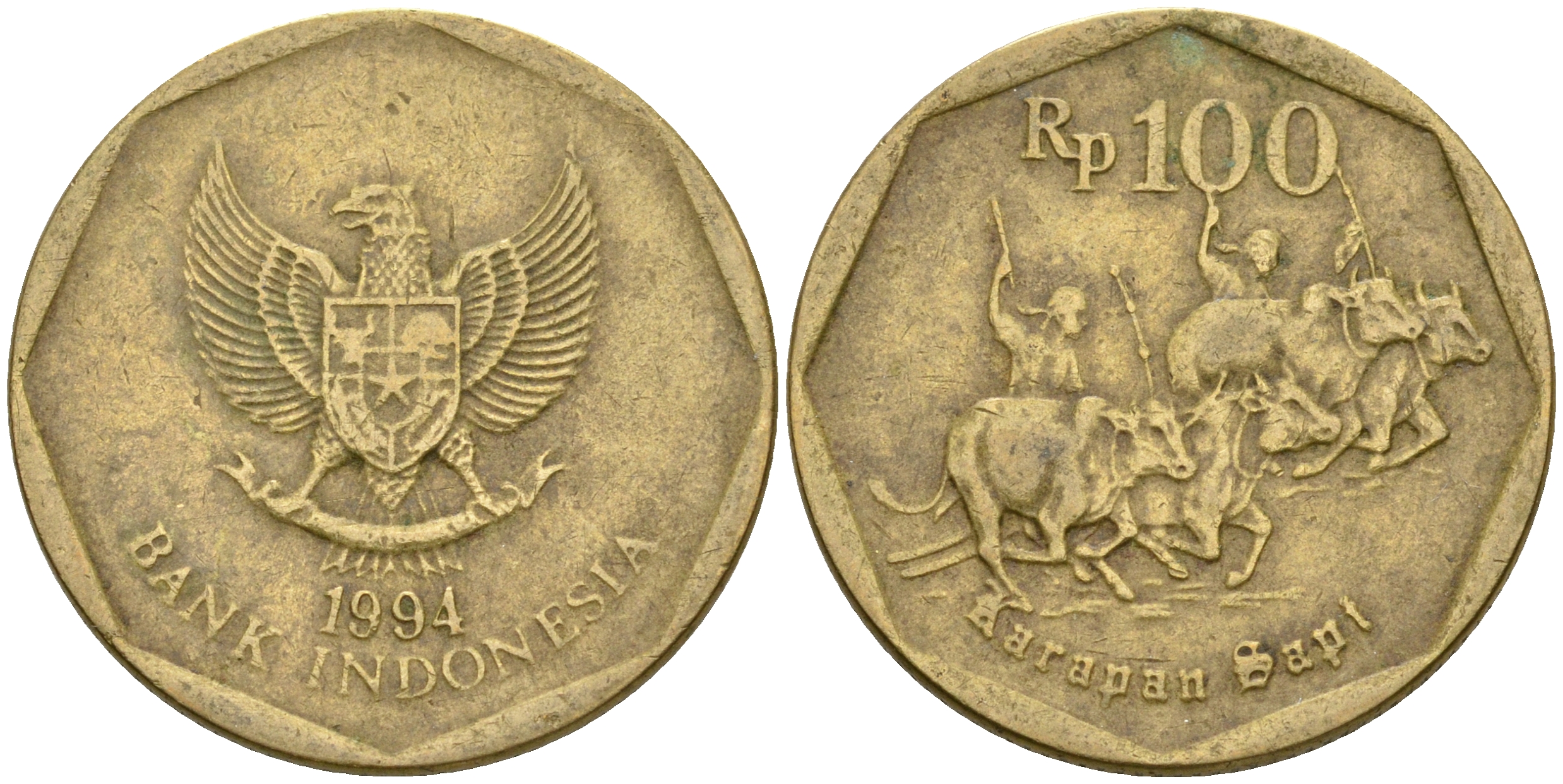 Индонезия 100 рупий 1994 гонки на быках KM 53 алюминиевая бронза 4364-2924