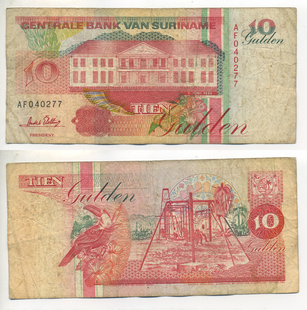 СУРИНАМ 10 ГУЛЬДЕНОВ 1995 1 ИЮНЯ 1995, ЗДАНИЕ ЦЕНТРАЛЬНОГО БАНКА, ТУКАН Pick 137b бумага 7523-37-3