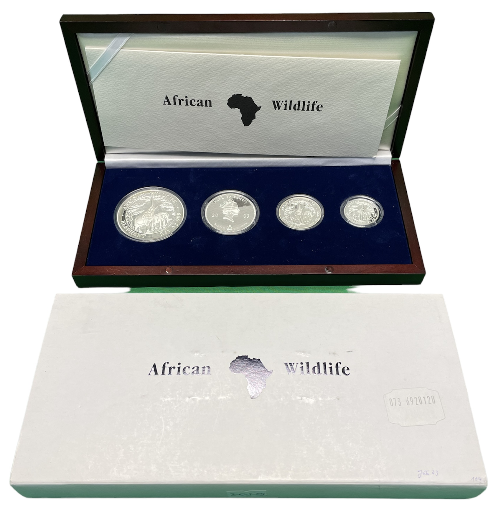 Замбия набор из 4 монет 2003 Дикая природа Африки 2003, слоны, 1000, 2000, 5000, 10000 квача (1/4 OZ, 1/2 OZ, 1 OZ, 2 OZ), в оригинальной деревянной коробке с сертификатом №0532, тираж 2000 экз. KM 183, 184, 185, 188 серебро PROOF 3-5-2-52