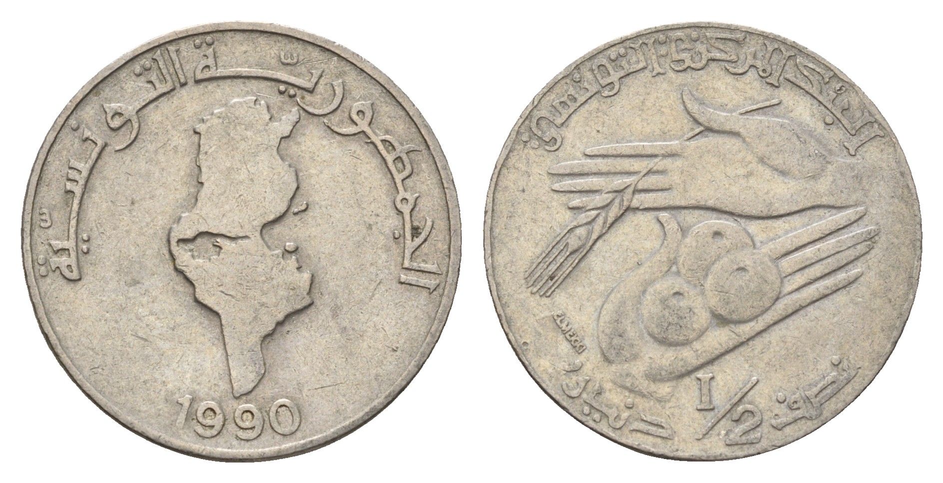 Тунис 1/2 динара 1990 KM 318 медно-никель 4641-1131