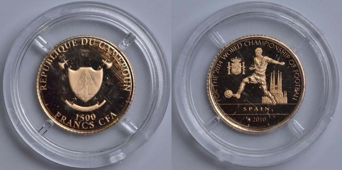 КАМЕРУН 1500 ФРАНКОВ 2014 ЧЕМПИОНАТ МИРА ПО ФУТБОЛУ - 2014, ИСПАНИЯ - ГОДЫ ЧЕМПИОНСТВА, ИГРОК С МЯЧОМ НА ФОНЕ СОБОРА САГРАДА ФАМИЛИЯ KM NEW золото PROOF 00-000-00