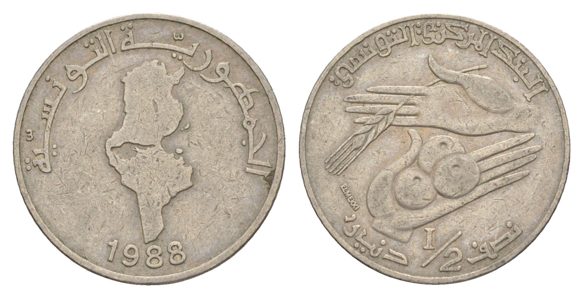 Тунис 1/2 динара 1988 KM 318 медно-никель 4513-131