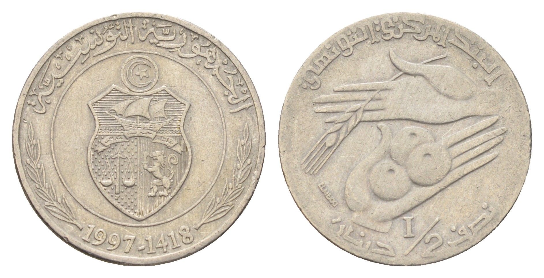 Тунис 1/2 динара 1997 KM 346 медно-никель 4706-657