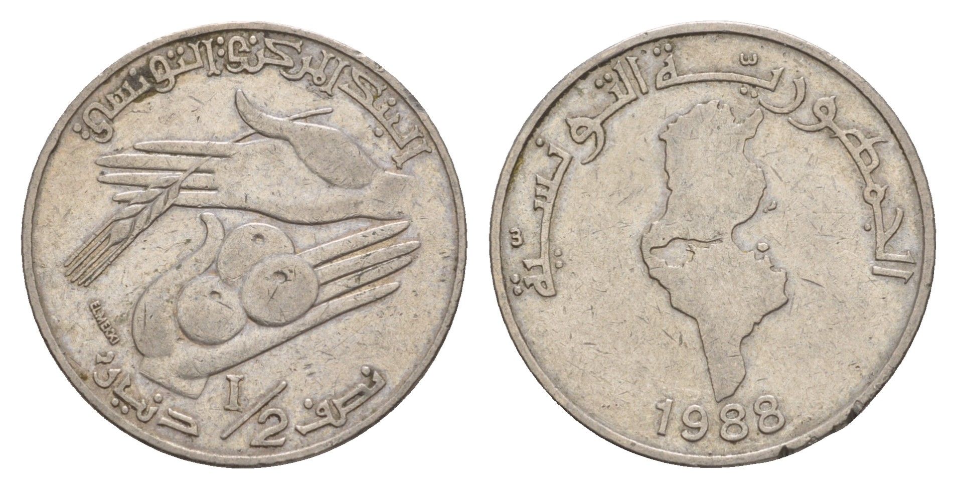 Тунис 1/2 динара 1988 KM 318 медно-никель 4656-816