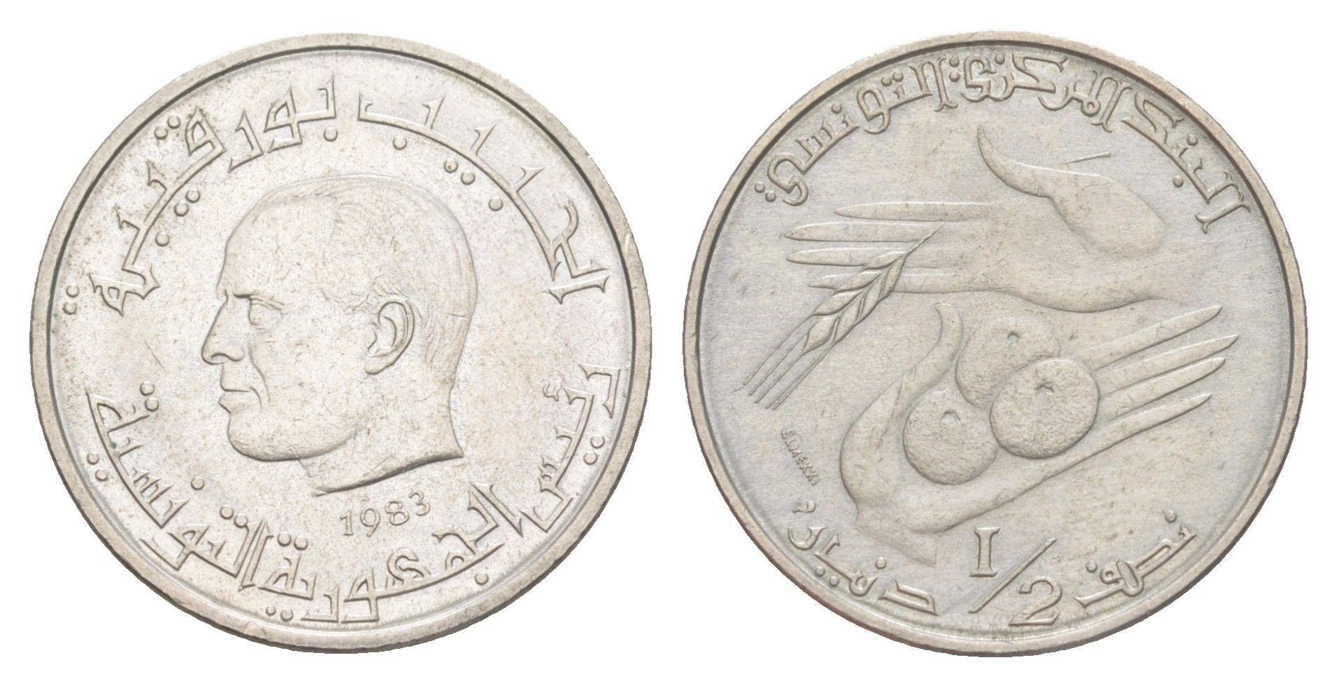 Тунис 1/2 динара 1983 KM 303 медно-никель UNC 4654-521