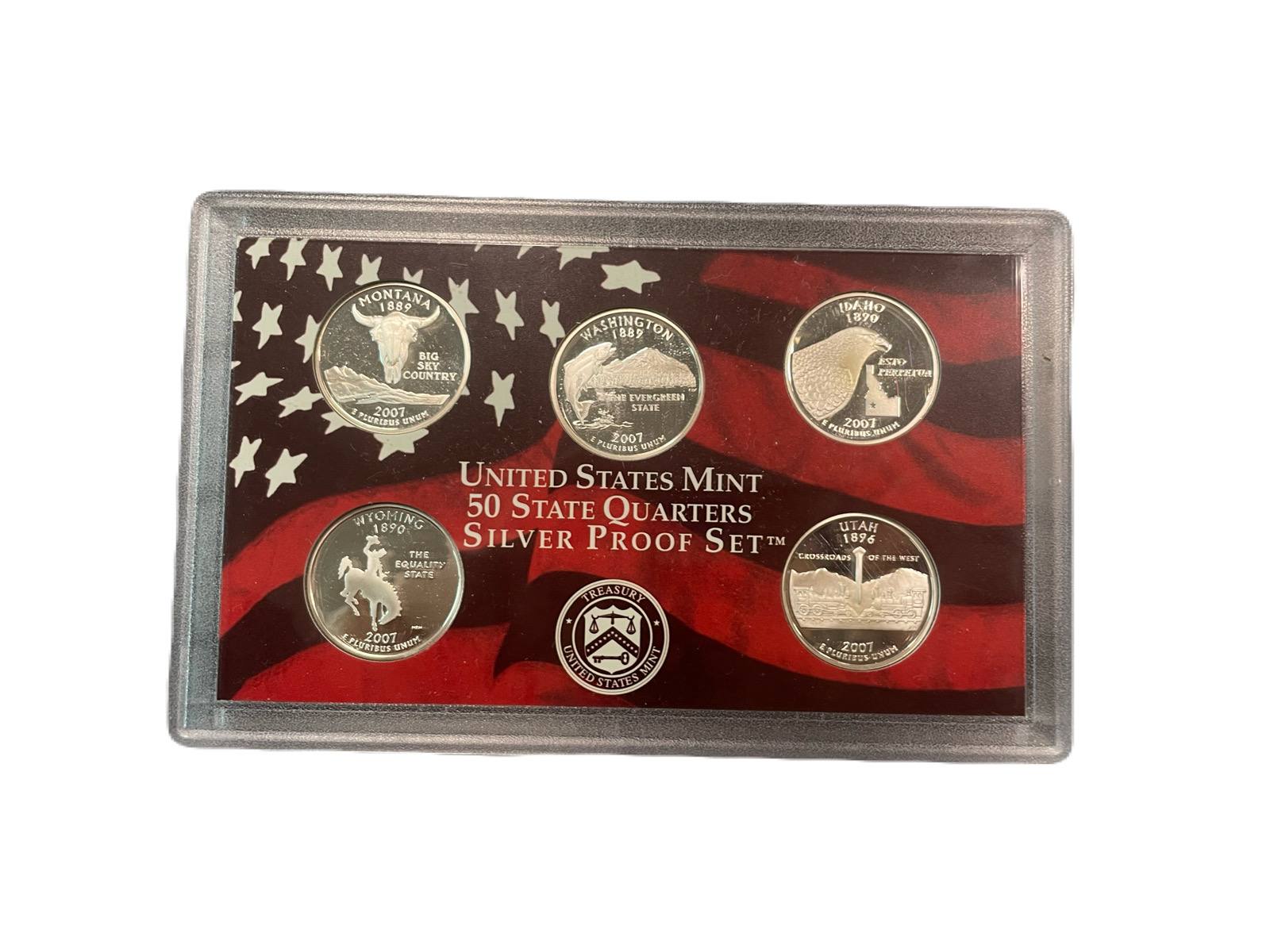 США полный годовой набор из 14 монет (1, 5, 10 (дайм) и 25 (квотер) центов; 1/2 (50 центов) и 1 доллар) 2007 в оригинальной упаковке с сертификатами KM 468, 381, 195a, A202b, 310, 396, 397, 398, 399, 400, 401, 402, 403 и 404 PROOF 5-4-1-18