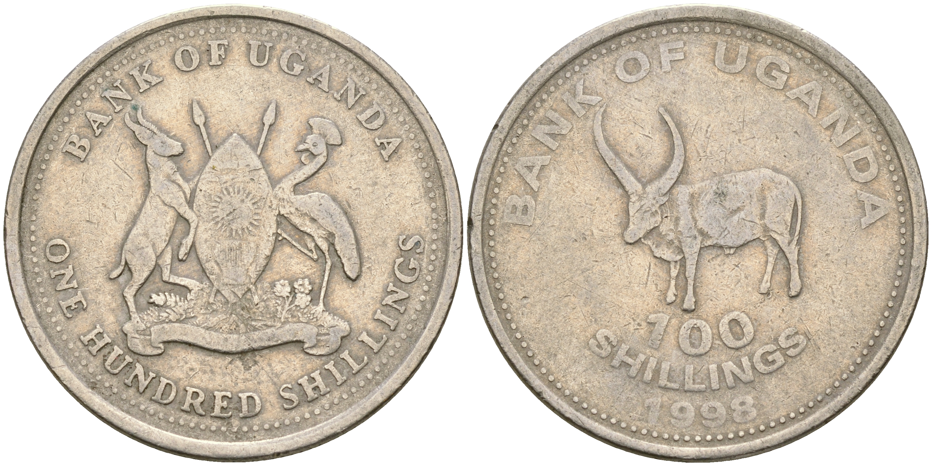 Уганда 100 шиллингов 1998 африканский буйвол KM 67 медно-никель 176-527