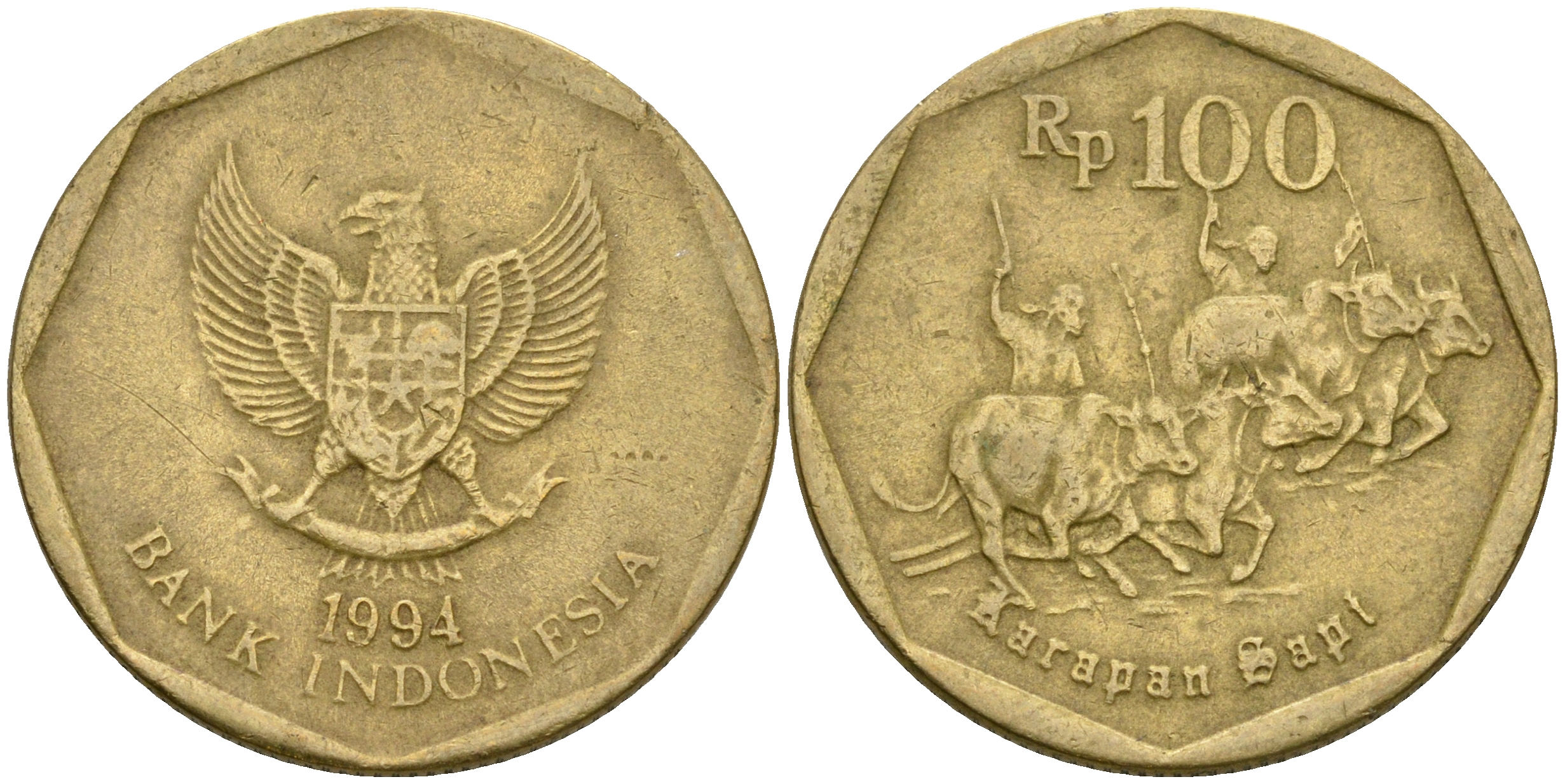 Индонезия 100 рупий 1994 гонки на быках KM 53 алюминиевая бронза 4364-2923