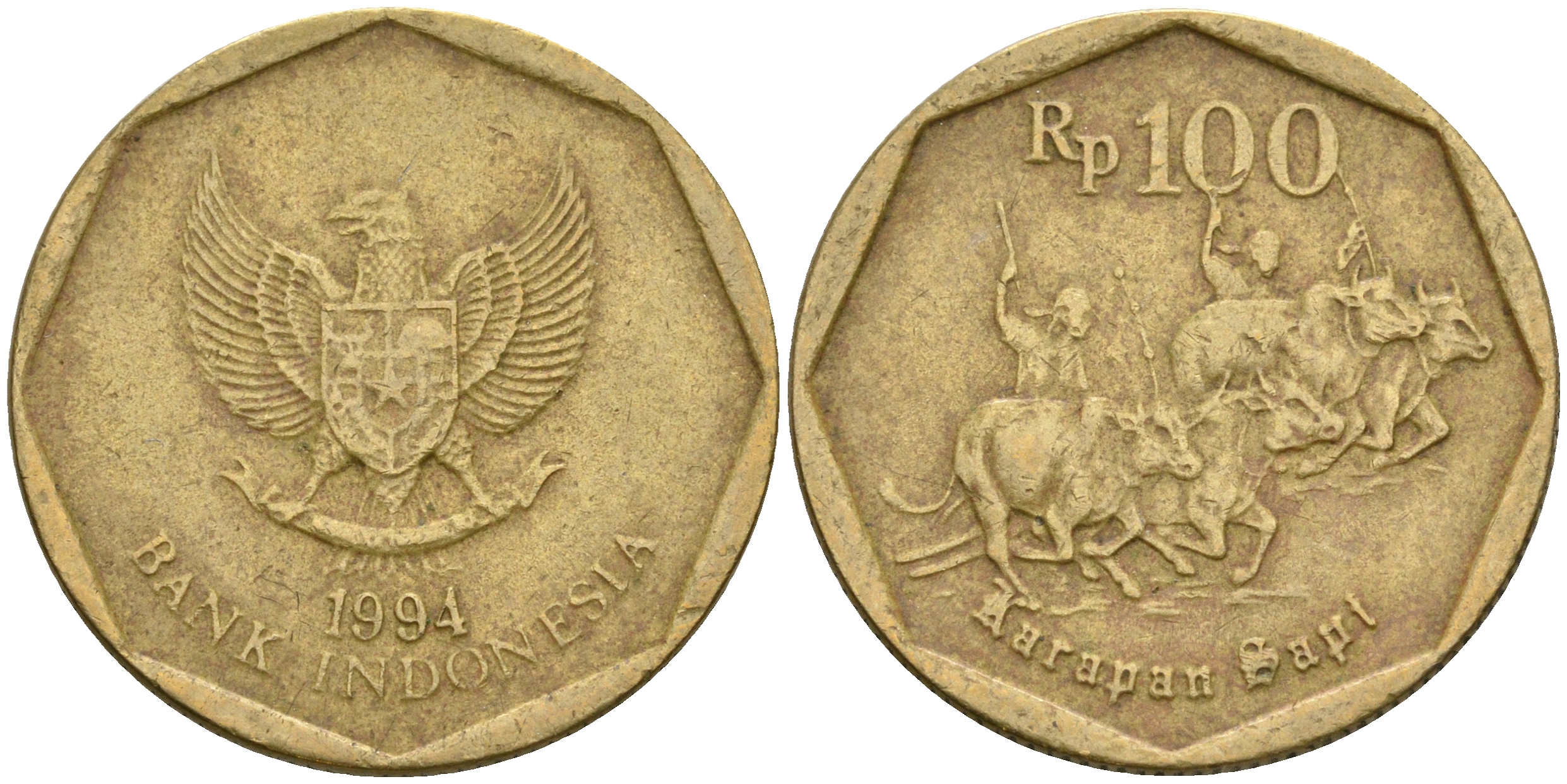 Индонезия 100 рупий 1994 гонки на быках KM 53 алюминиевая бронза 4364-2922