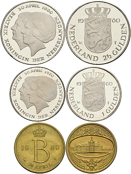 Нидерланды набор из 2 монет и 1 жетона монетного двора 1 гульден 2 1/2 гульдена в оригинальной коробке с сертификатом 1980 коронация Беатрикс KM 200, 201 медно-никель  UNC  2-4-2-52